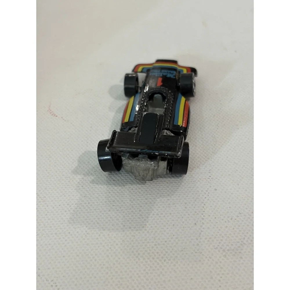 1982 Hot Wheels Malibu Grand Prix 1973 Malaysia Blackwalls Metal Base Black #1